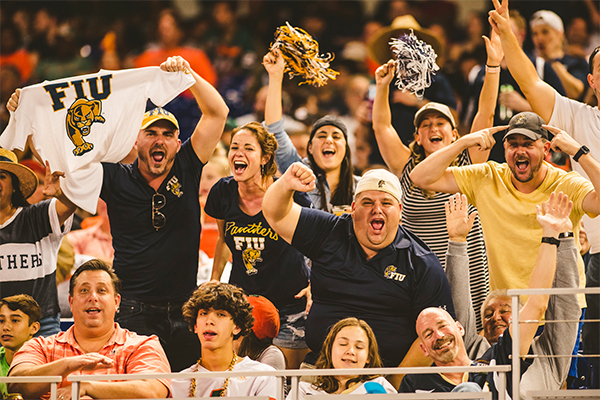 Student, faculty, staff & the community cheering for FIU at the FIU vs. UM game